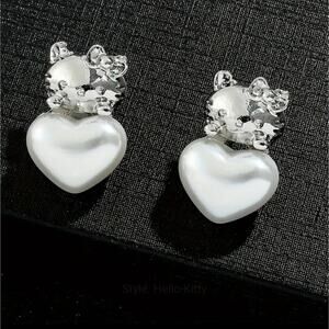 Sanrio Hello Kitty faux pearl heart shaped post earrings